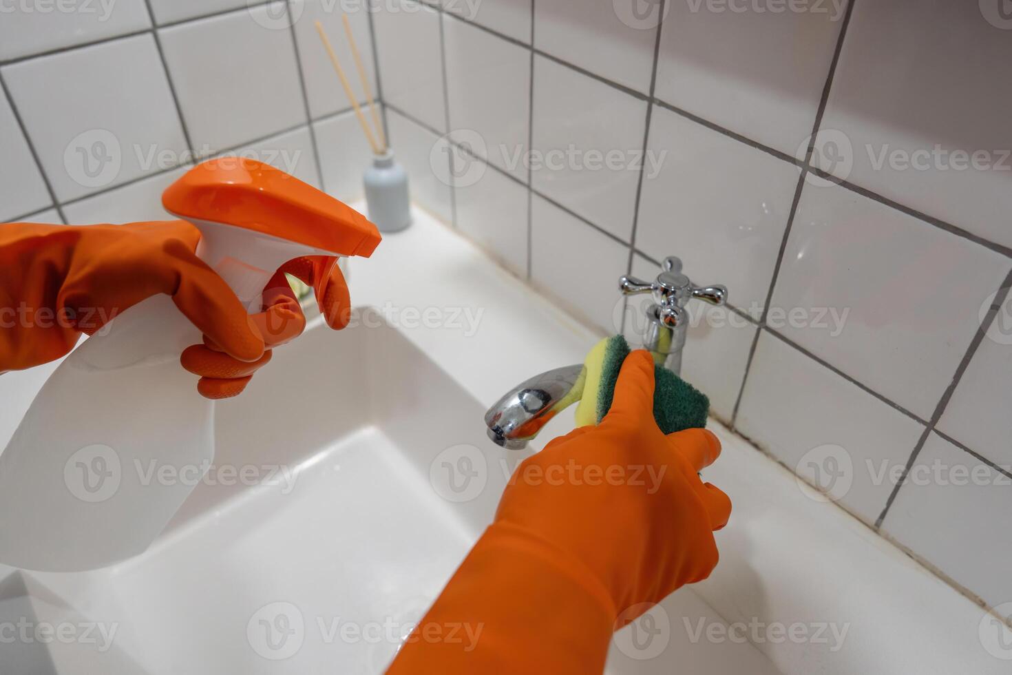 Woman maid asian or charwoman hand cleaning bathroom photo