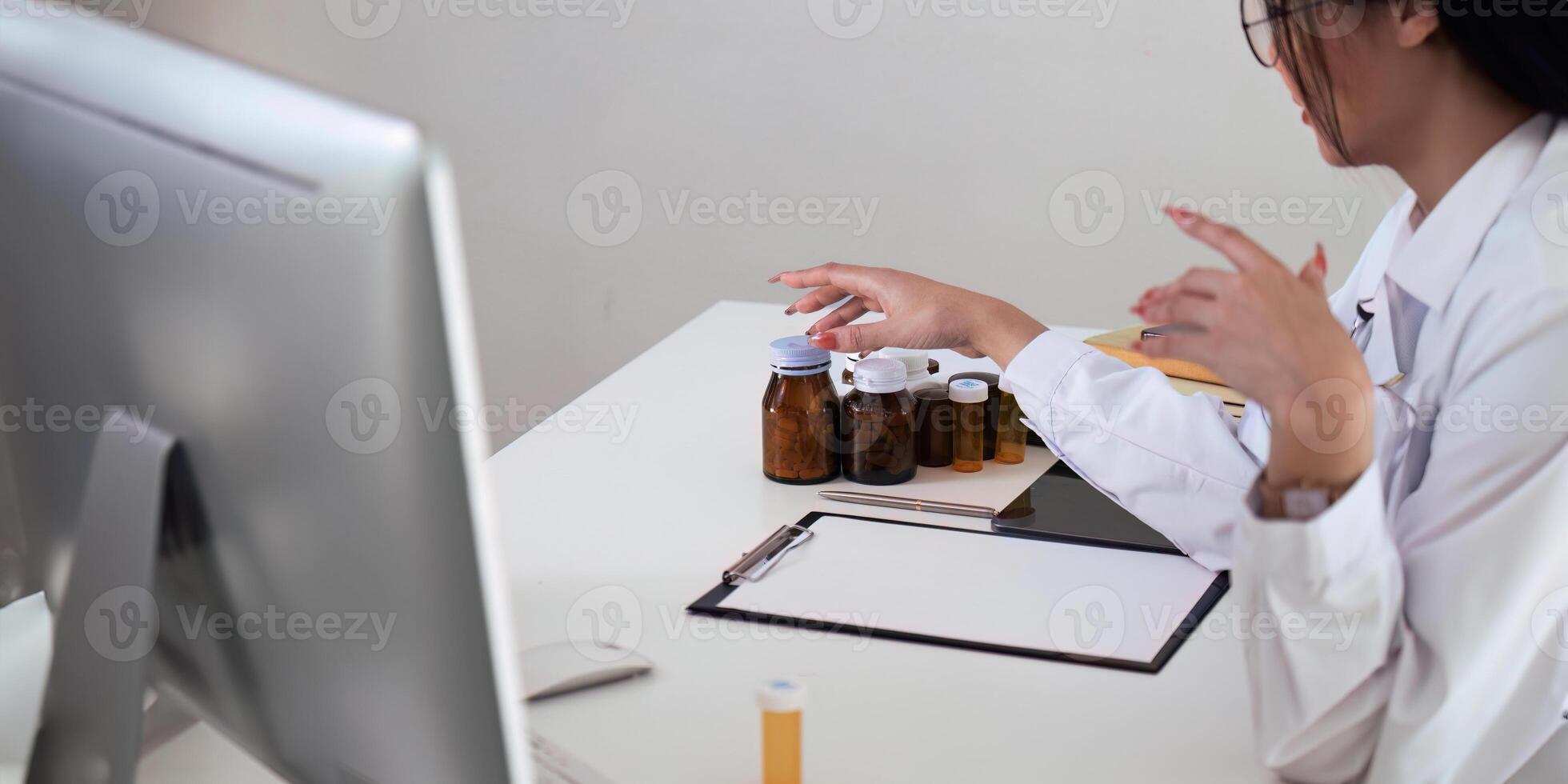 Physician discuss results or symptoms and gives a recommendation to a male patient and signs a medical paper at an appointment visit in the clinic photo
