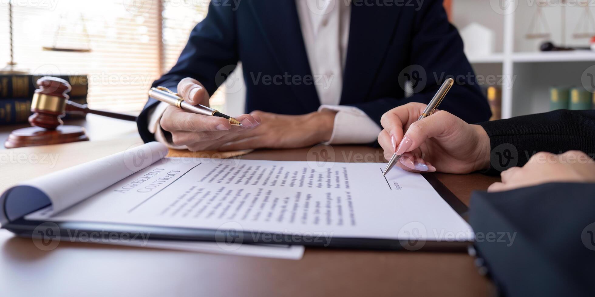 Professional Lawyer Signing Contract with Client in Office. Business Agreement, Legal Services, and Corporate Deal Concept photo