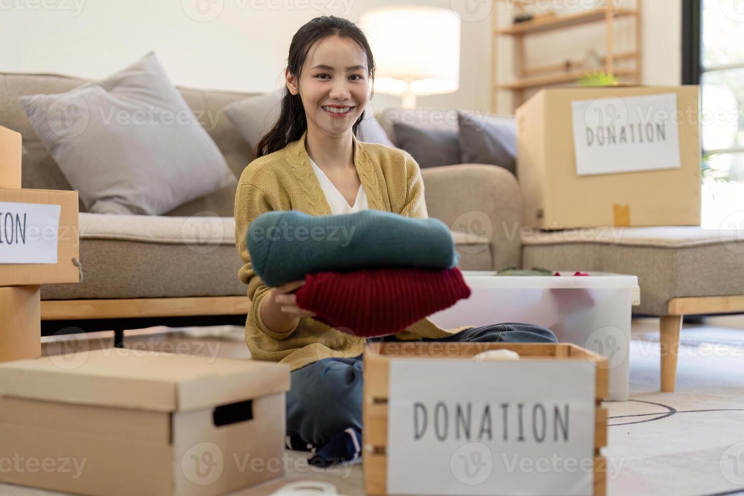 Volunteers Donation Clothes for Charity. Community Service, Social Responsibility, and Helping Those in Need. Concept of Generosity, Kindness, and Support Through Clothing Donation photo