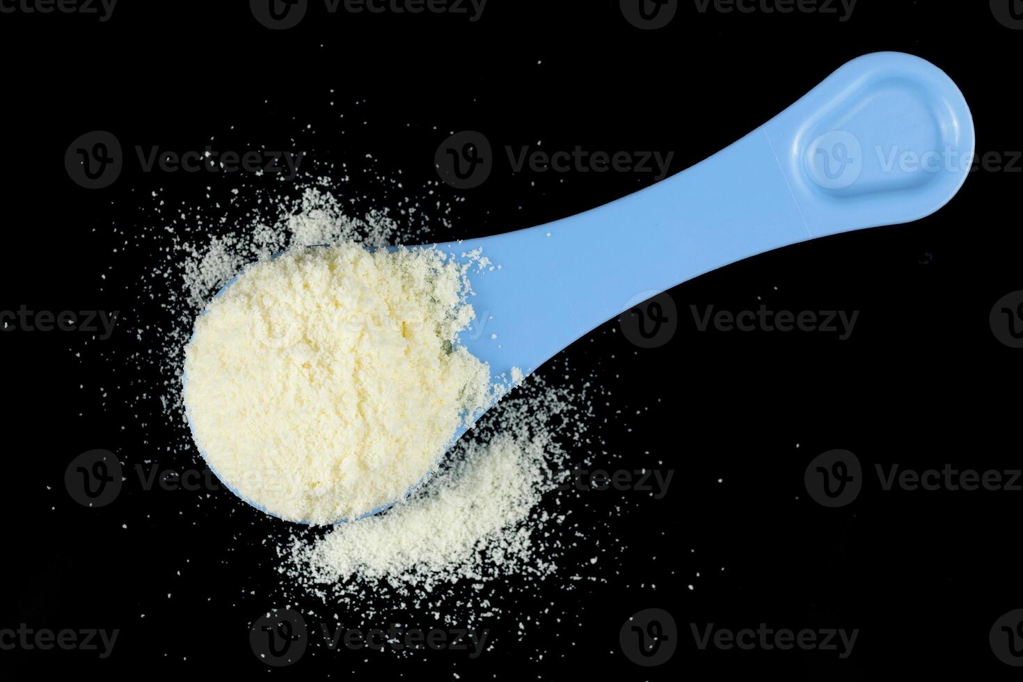 Yellow baby food powder in a pile. photo