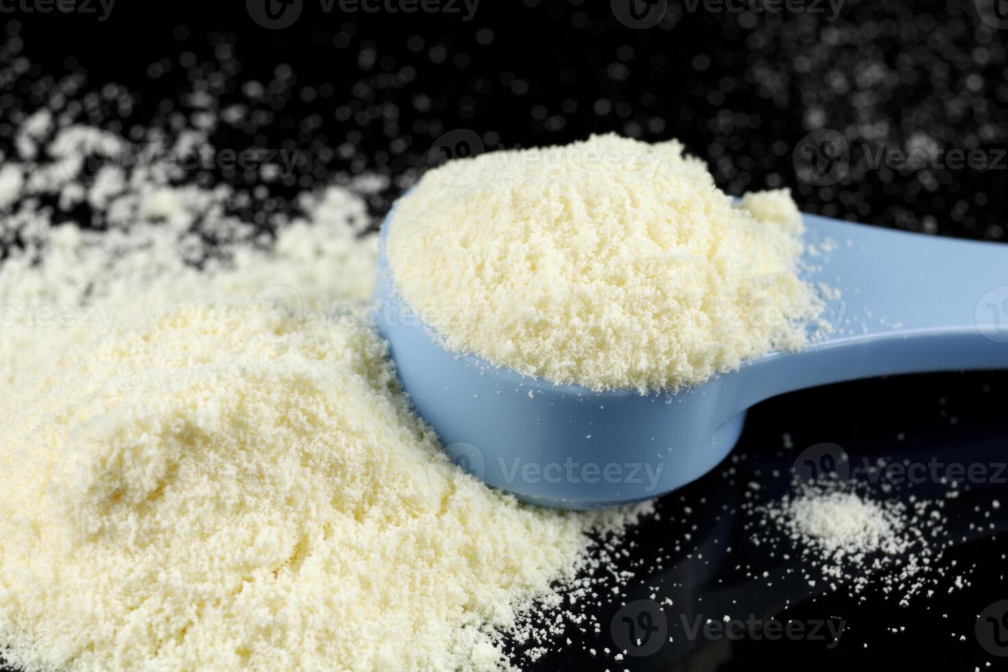 Yellow baby food powder in a pile. photo