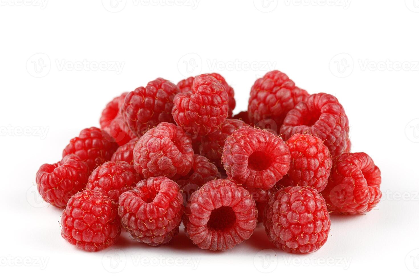 Heap of raspberries on white isolate. photo