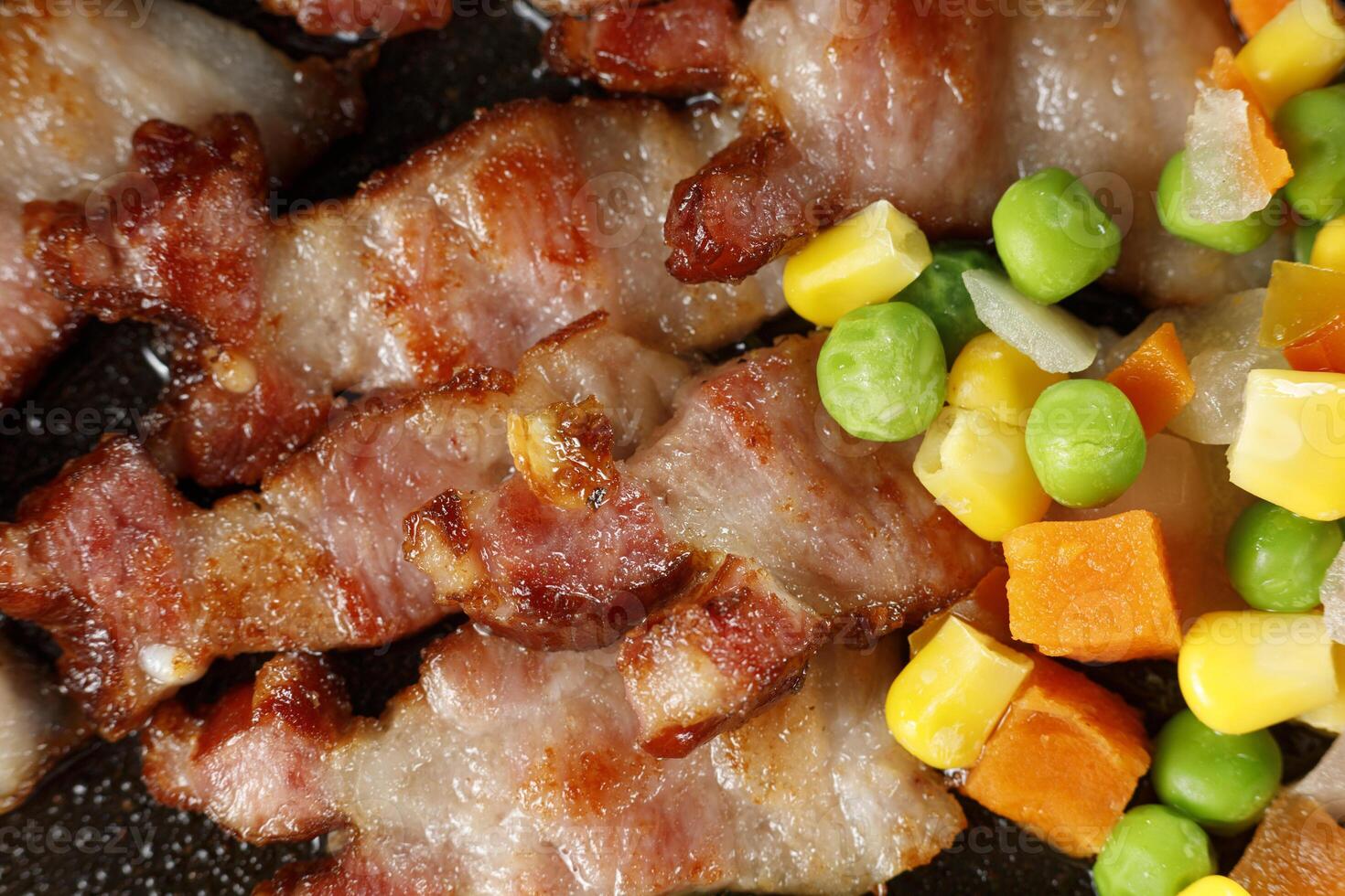 Vegetables with bacon. Tasty and simple food. Traditional lunch. photo