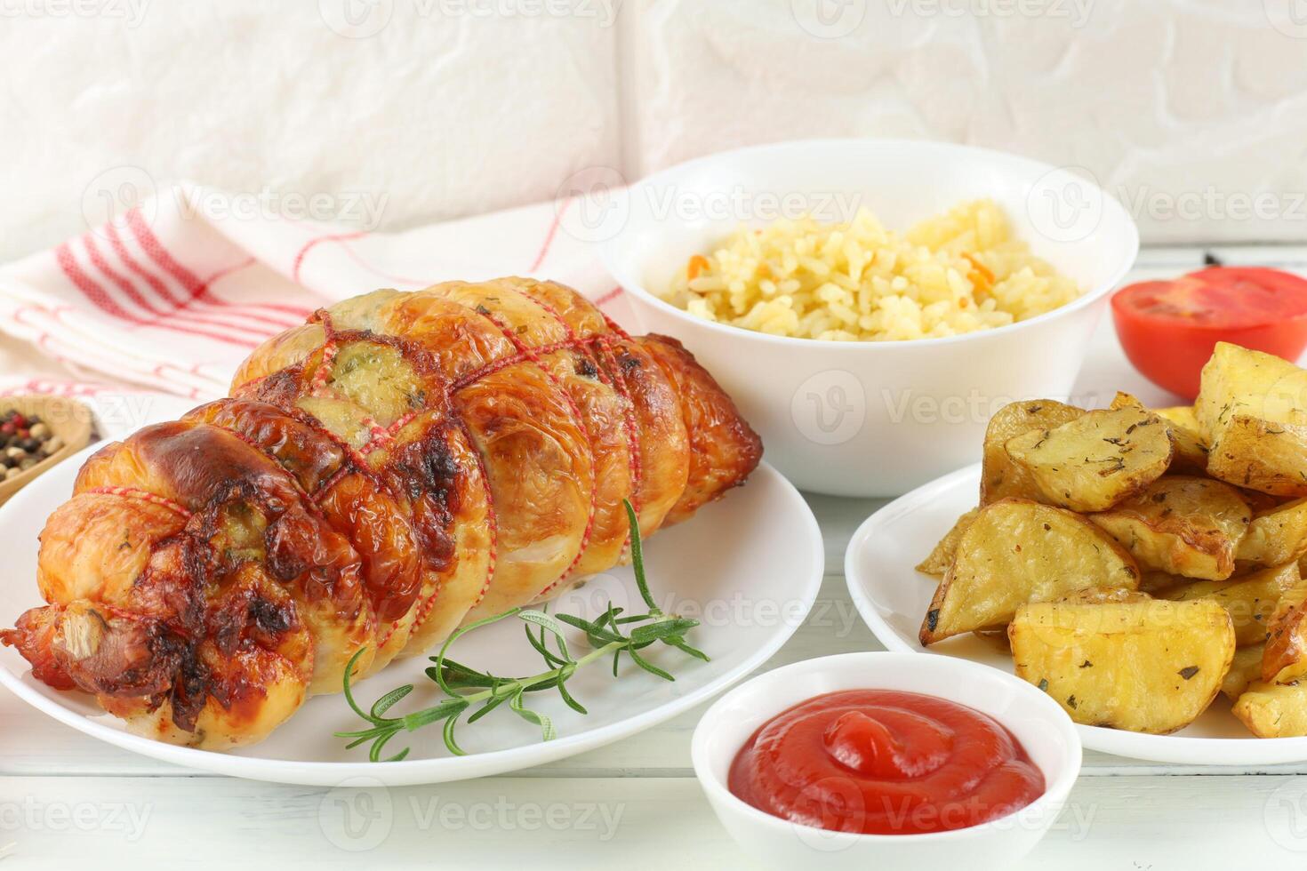 boneless meat roulade on the table. Delicious food in the restaurant. photo