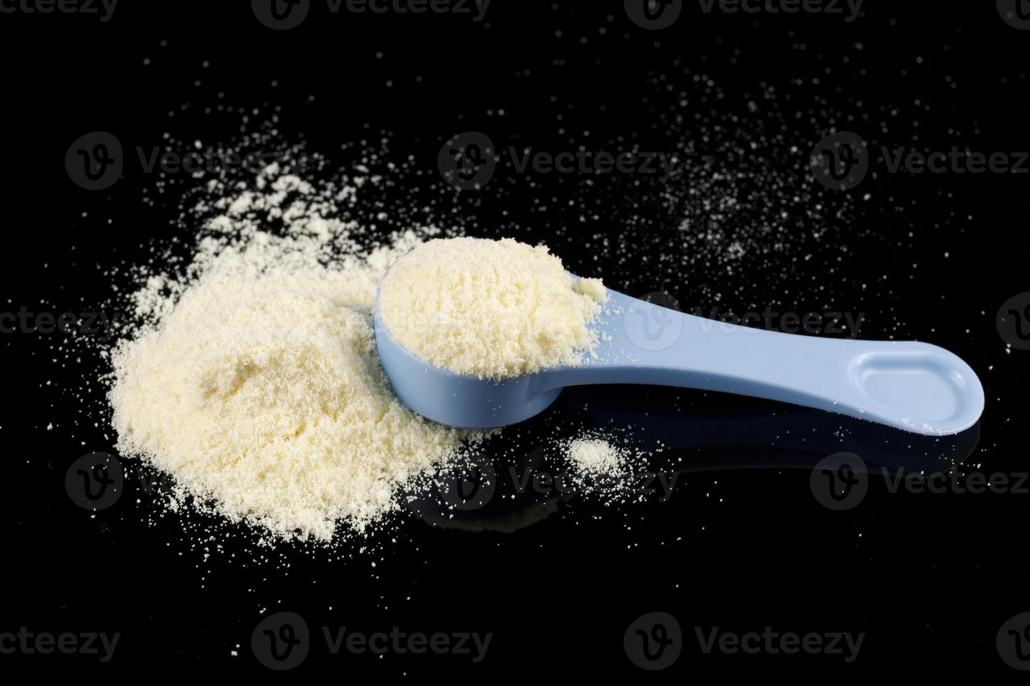 Yellow baby food powder in a pile. photo