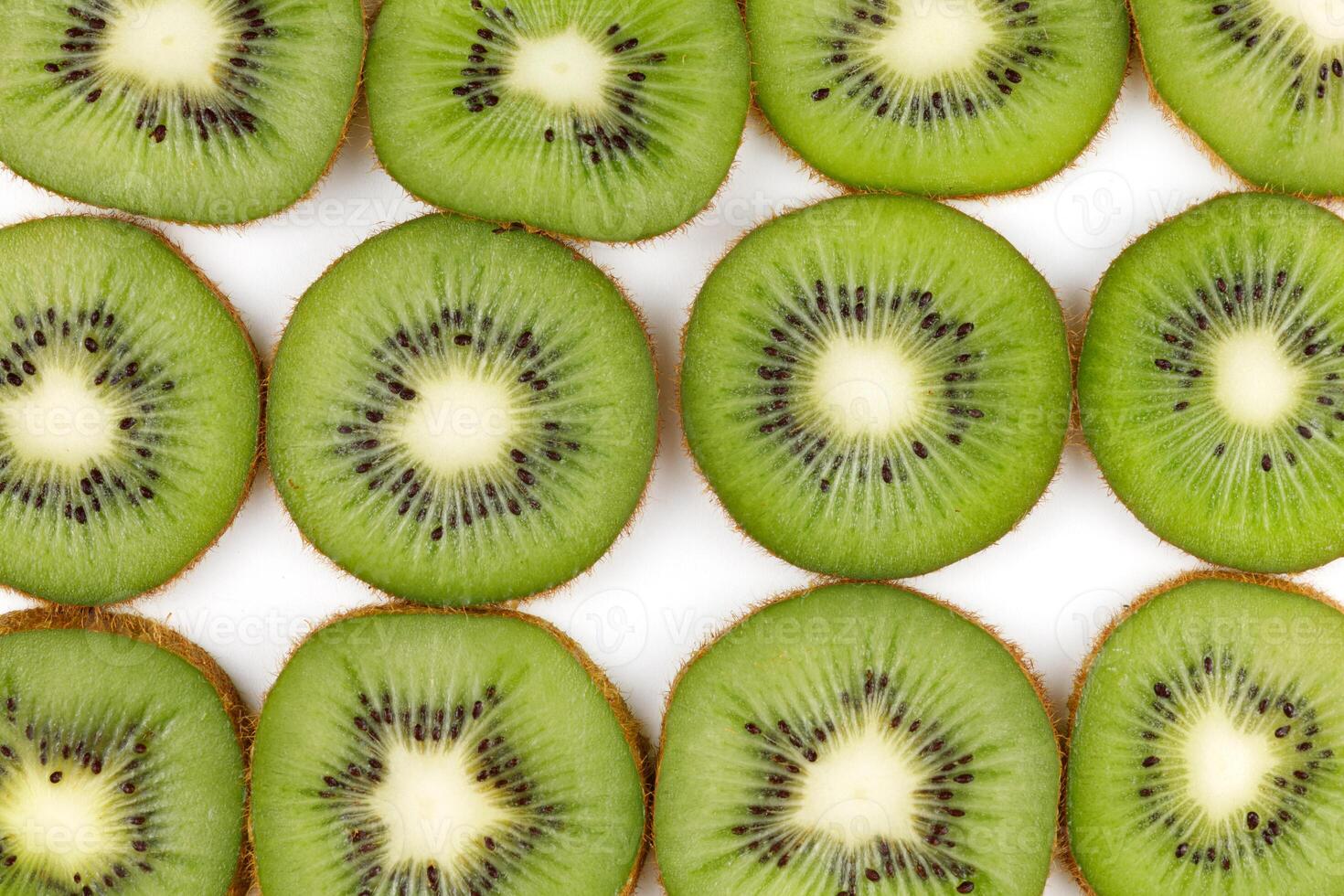 Sliced kiwi. Kiwi texture or background. Kiwi pattern photo