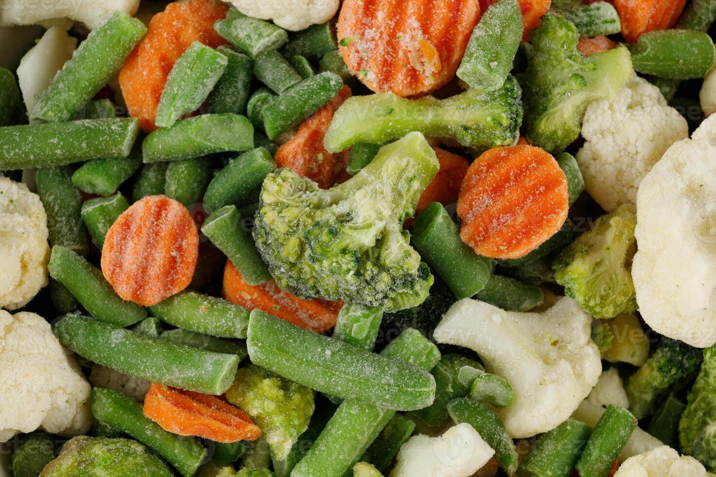 Frozen vegetables close-up. Frozen Vegetable Background photo
