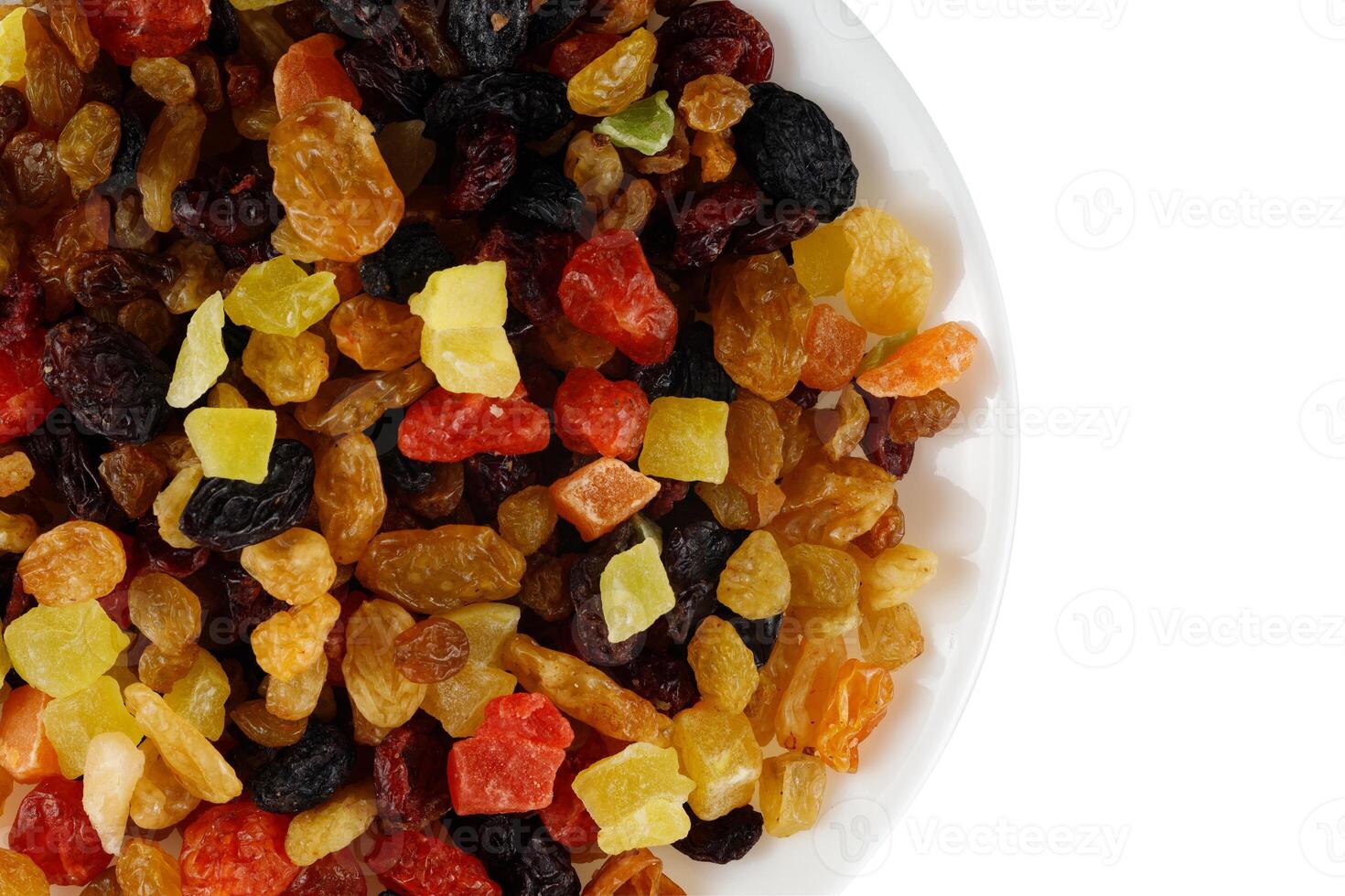 Dried exotic fruits on a plate. photo
