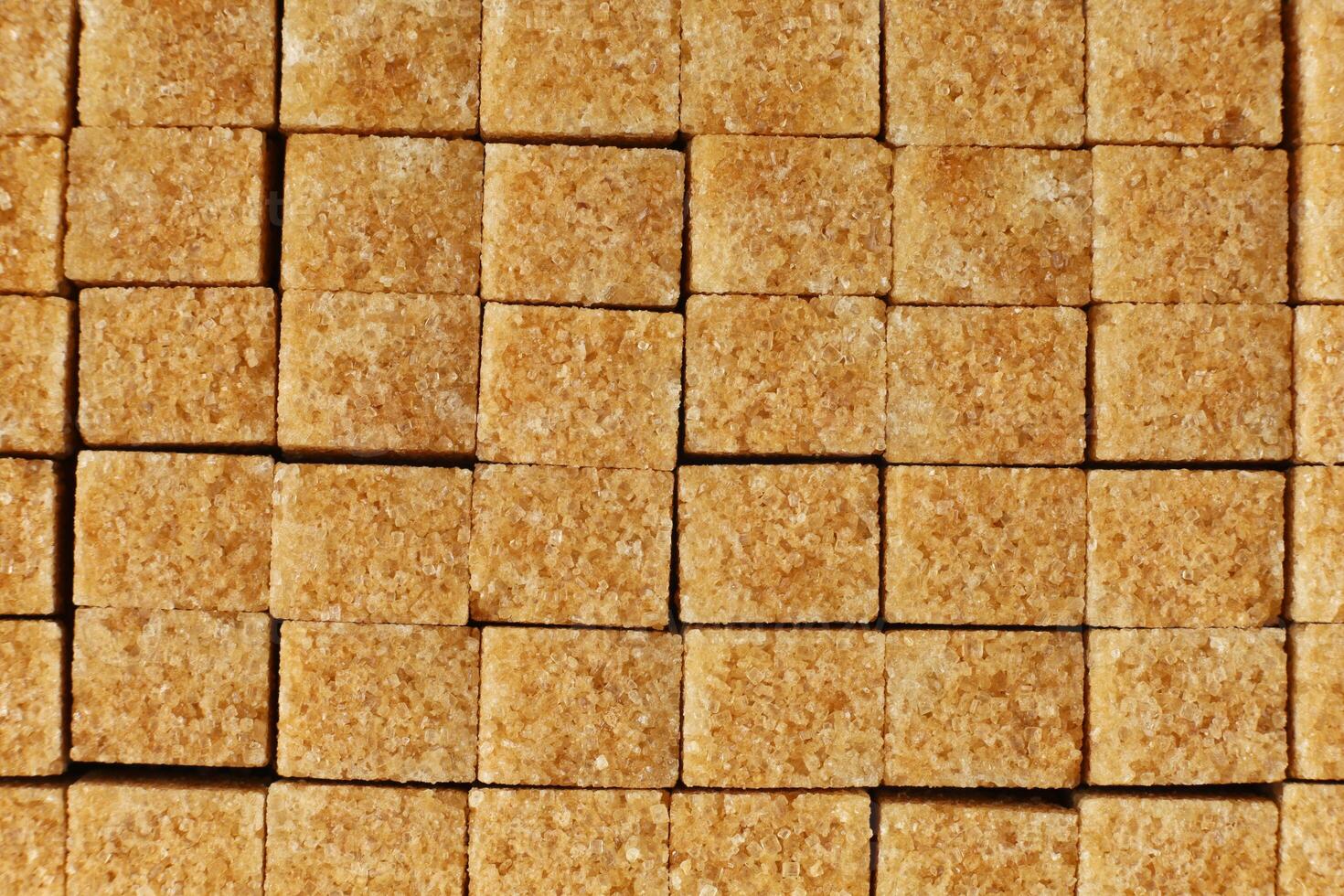 Brown cane sugar in cubes photo