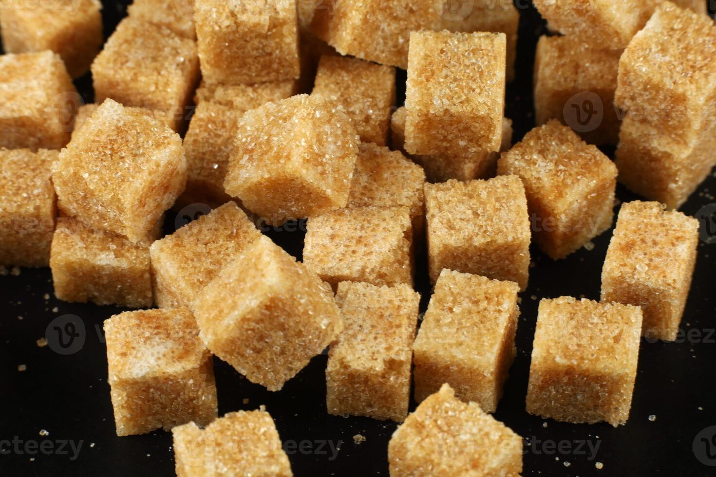 Brown cane sugar in cubes photo