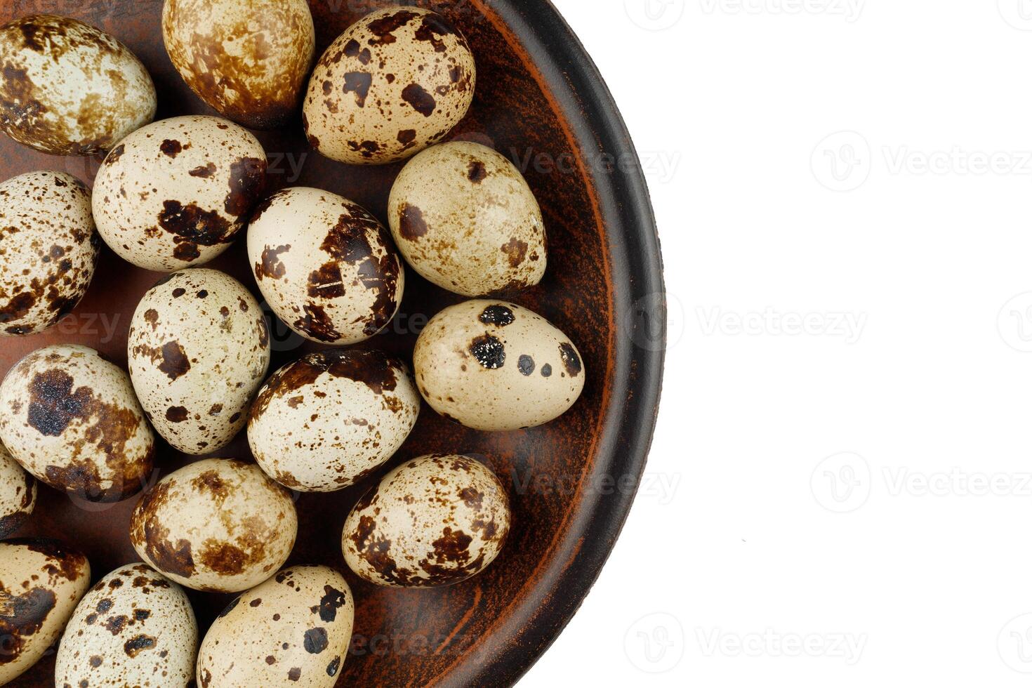 Quail eggs on a plate isolate. photo