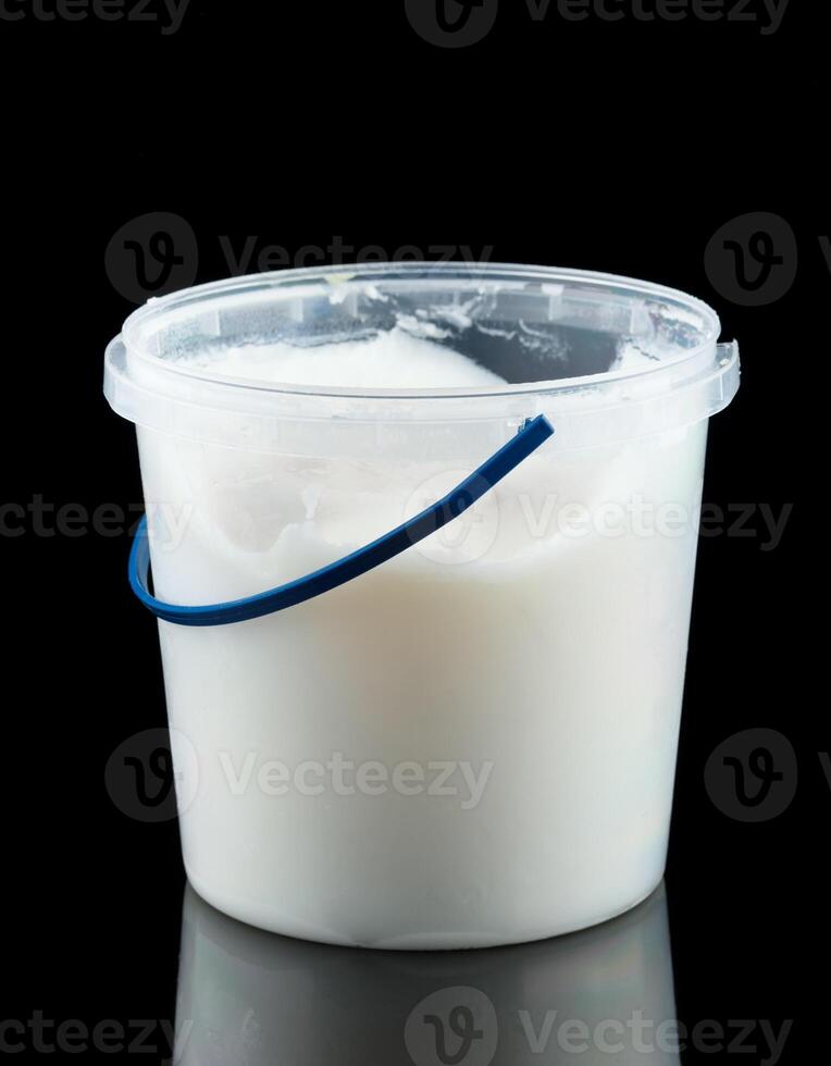 Lard in a plastic bucket. photo