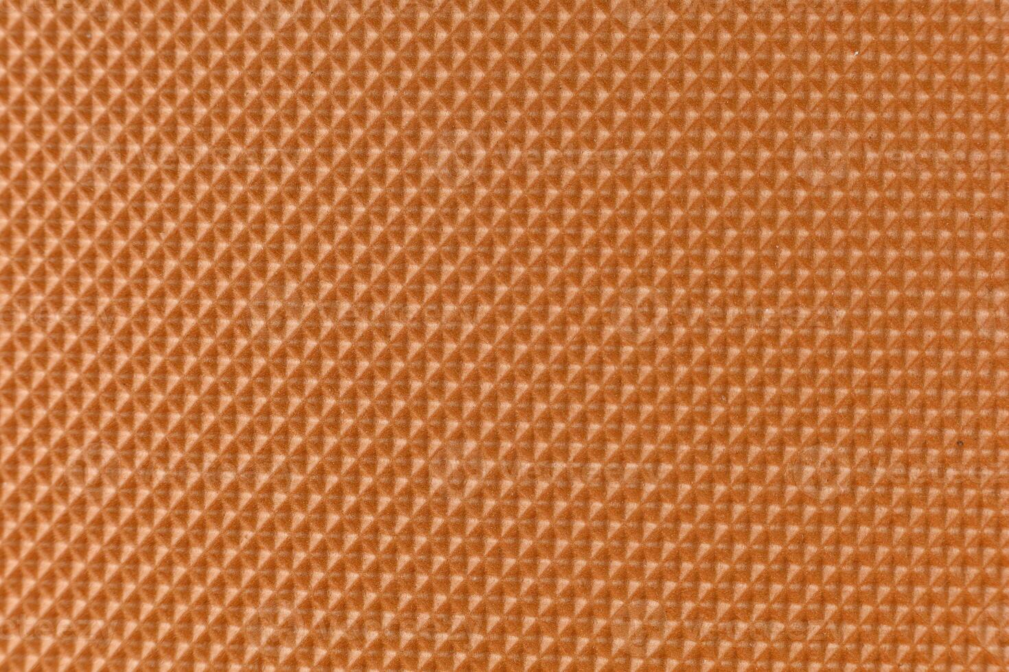 Brown textured rubber surface background photo