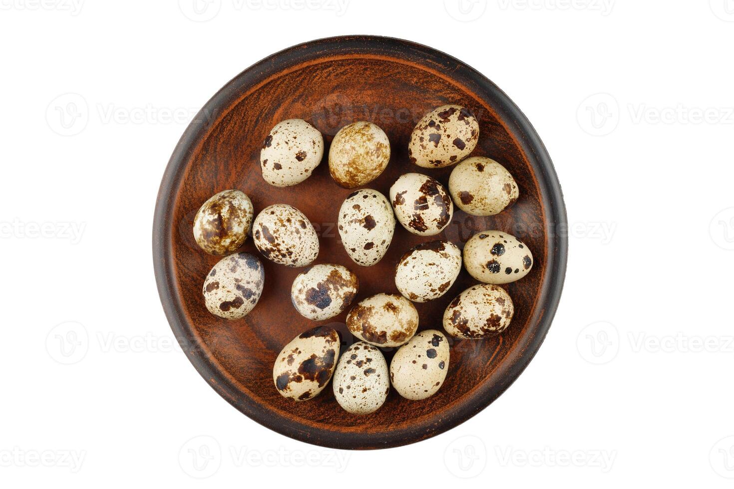 Quail eggs on a plate isolate. photo