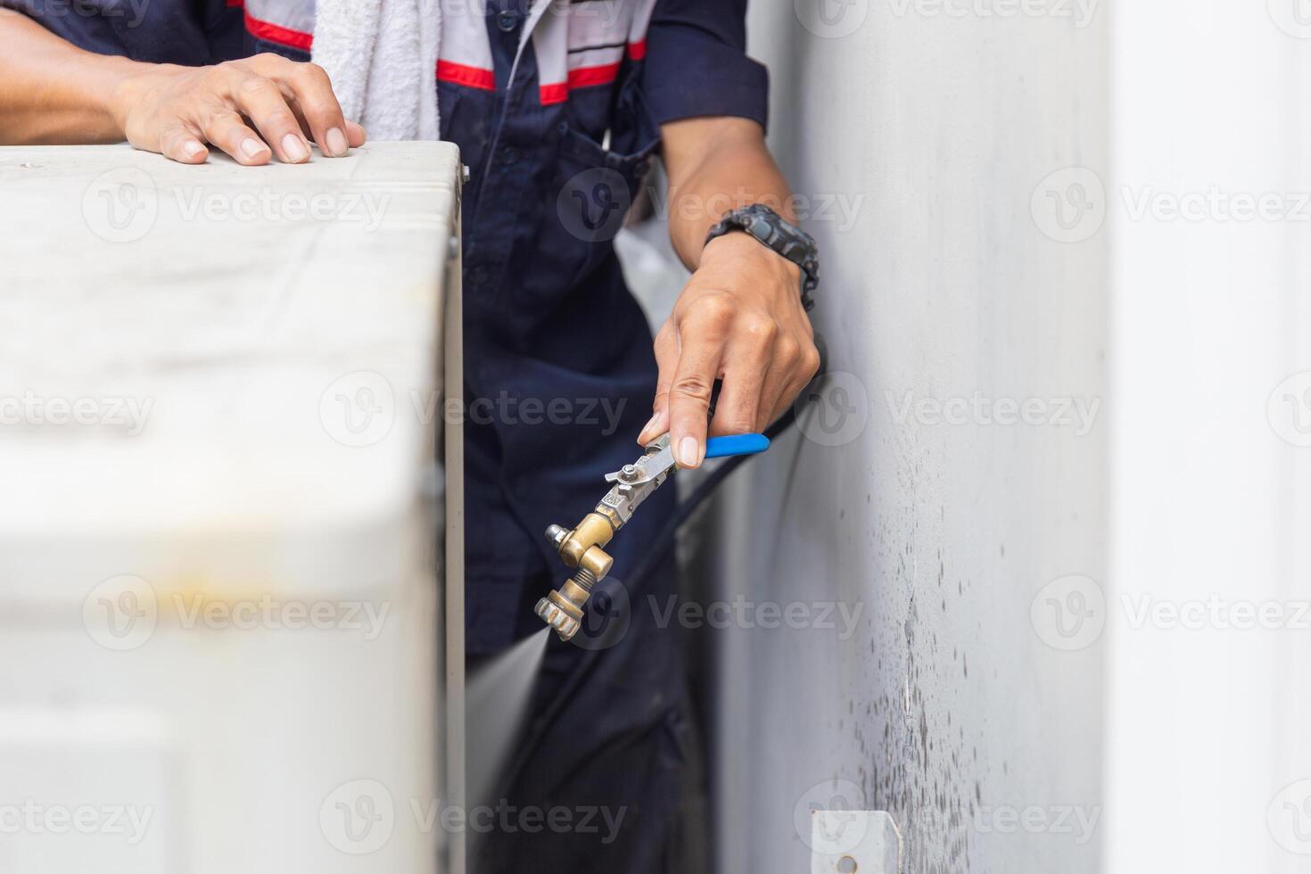 Technical man clean air conditioning system, Repairman washing dirty inside the compartments air conditioner, Maintenance and service concepts photo
