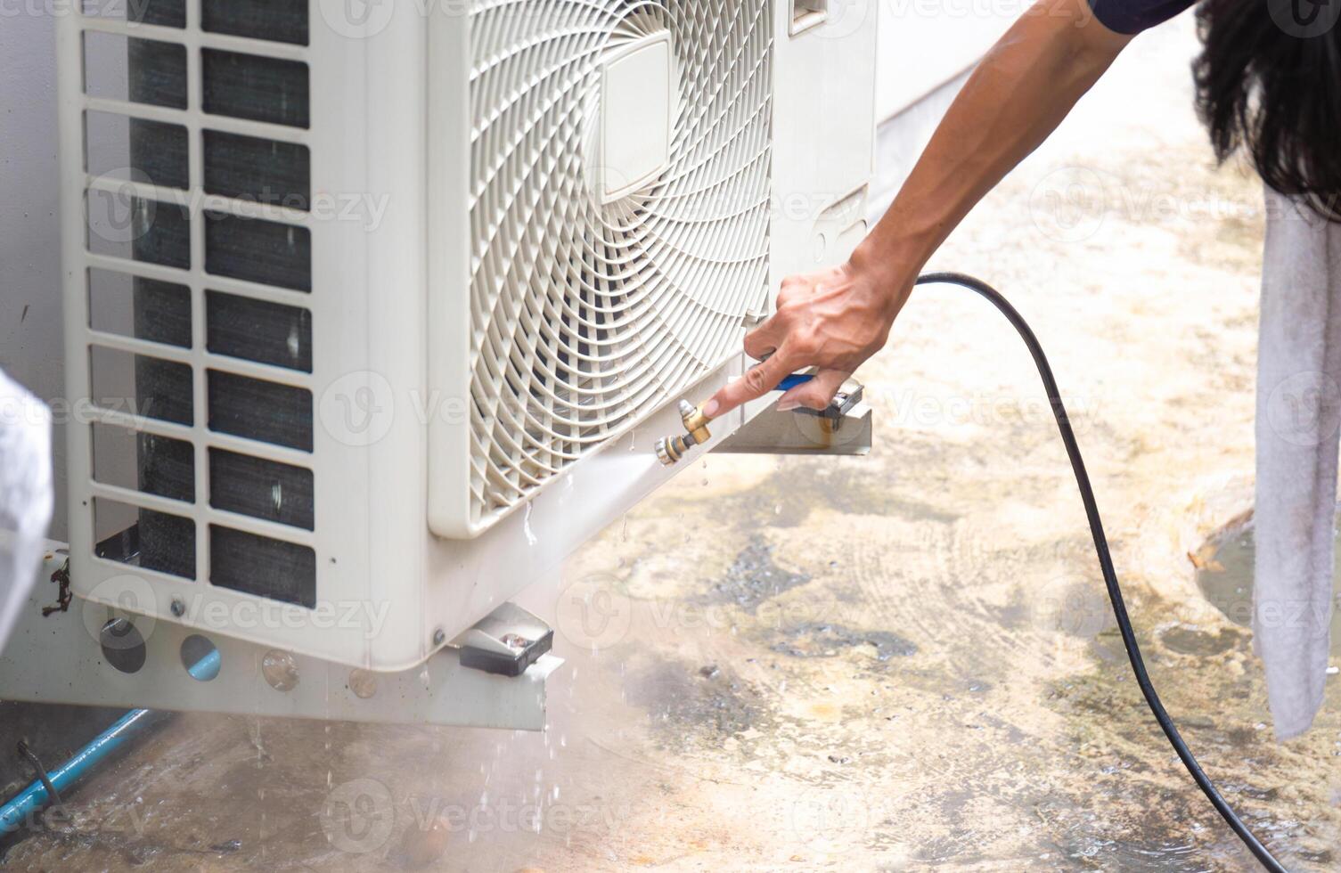 Technical man clean air conditioning system, Repairman washing dirty inside the compartments air conditioner, Maintenance and service concepts photo