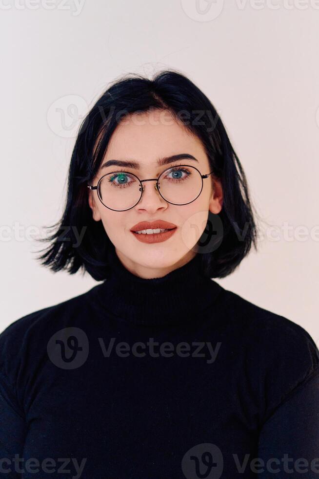 Smiling Brunette Woman Wearing Eyeglasses Poses on White Background photo