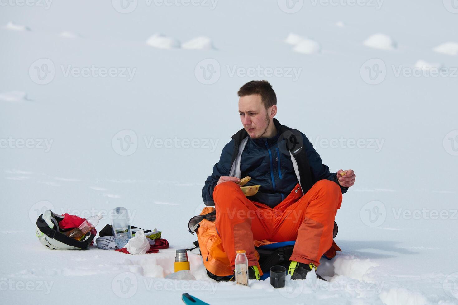 A Skier Takes a Well-Deserved Break to Enjoy the View photo