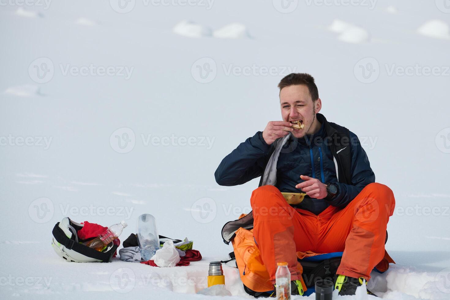 A Skier Takes a Well-Deserved Break to Enjoy the View photo