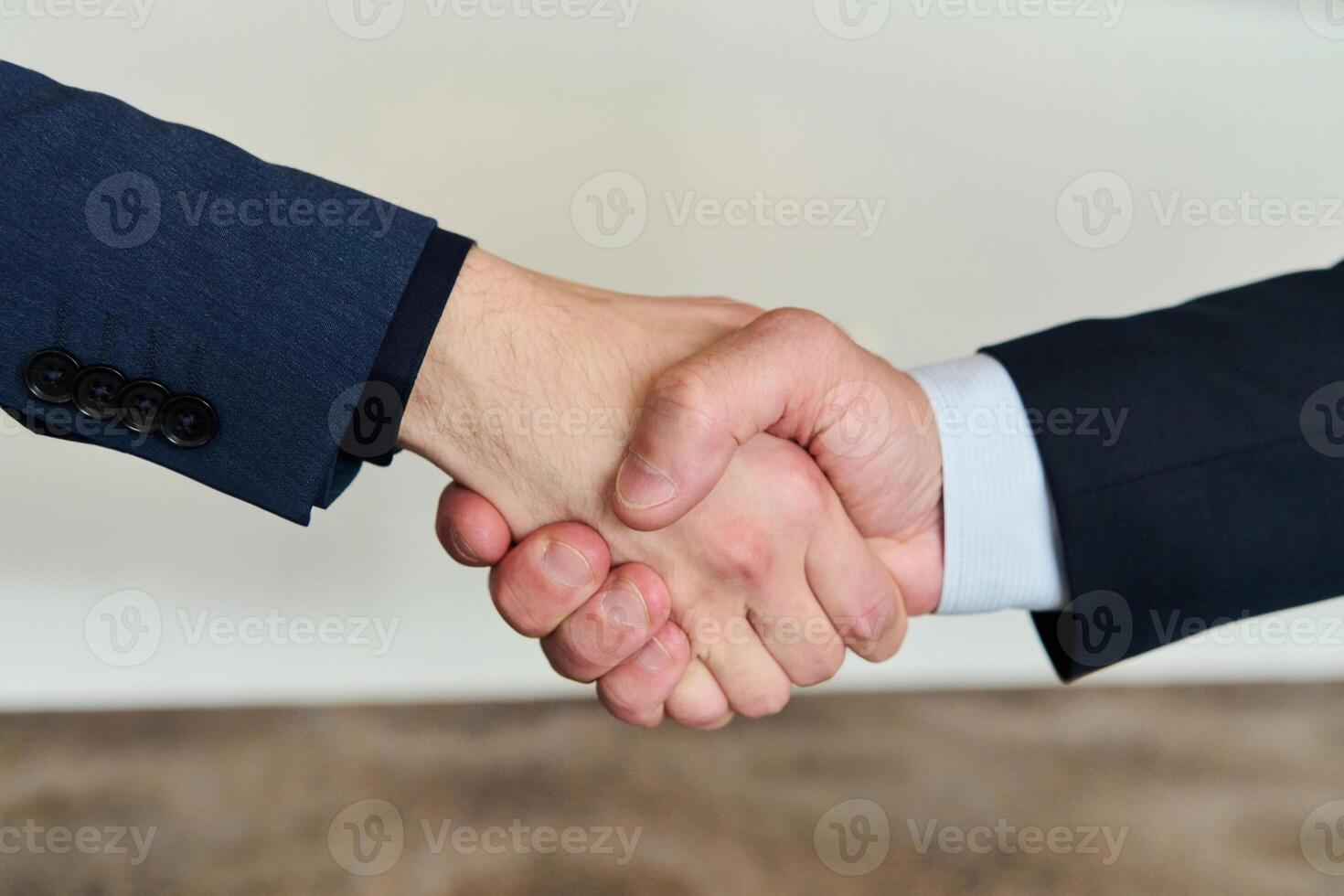 Businessmen making handshake with partner, greeting, dealing, merger and acquisition, business joint venture concept, for business, finance and investment background, teamwork and successful business photo