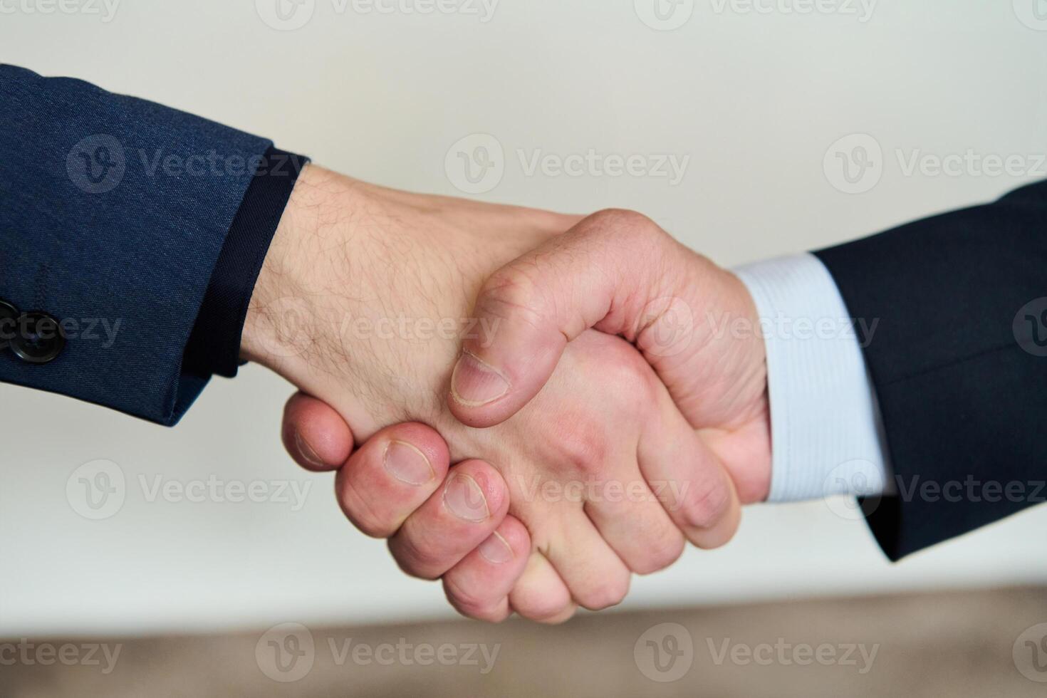 Businessmen making handshake with partner, greeting, dealing, merger and acquisition, business joint venture concept, for business, finance and investment background, teamwork and successful business photo