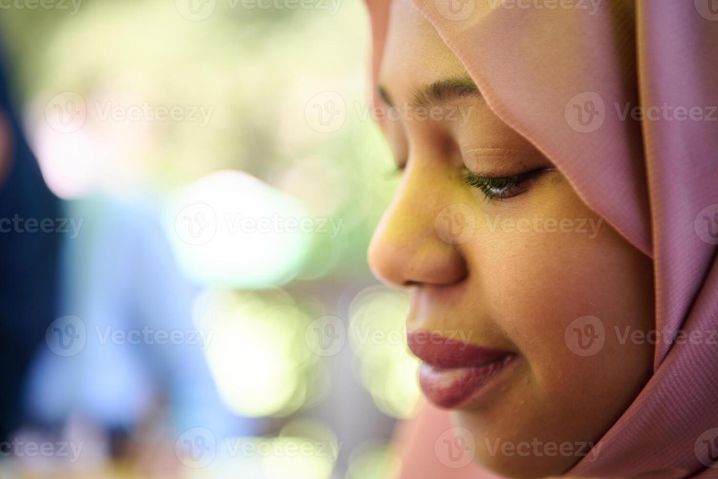 Close up Portrait of a Joyful Middle Eastern Hijabi photo