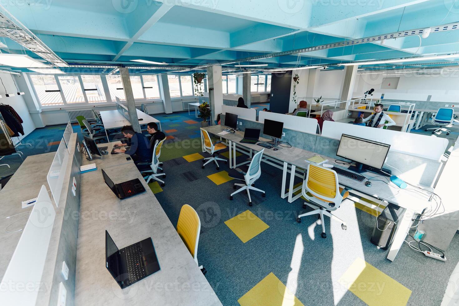 Photo of a modern office where programming, digital marketing and web design projects are done. Office with modern furniture and glass office