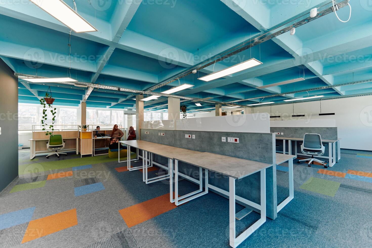 Photo of a modern office where programming, digital marketing and web design projects are done. Office with modern furniture and glass office