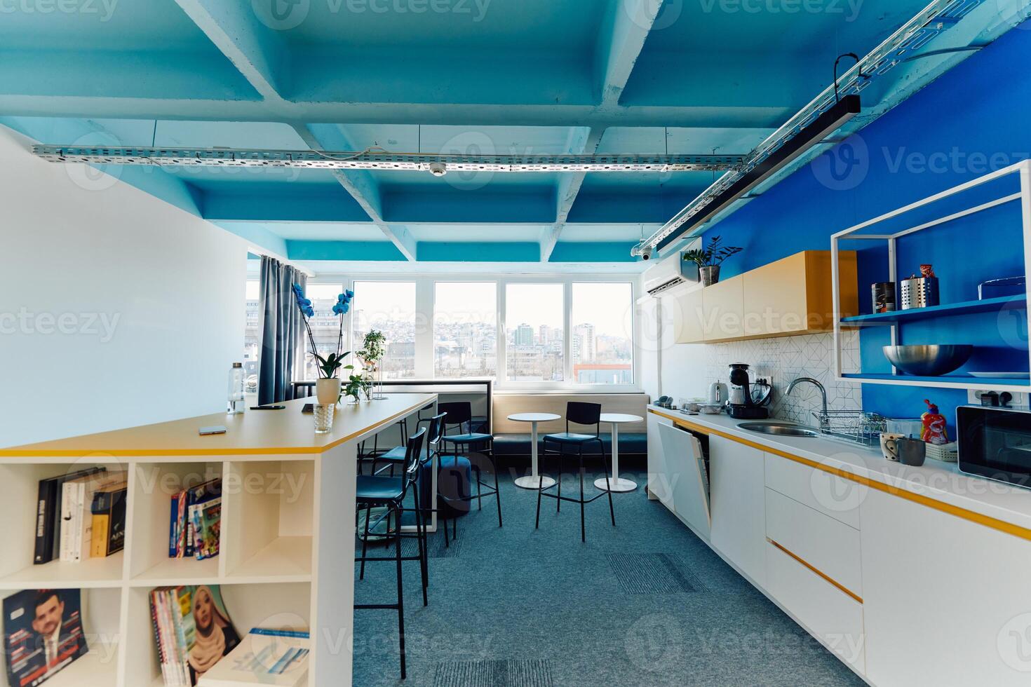 Photo of a modern office where programming, digital marketing and web design projects are done. Office with modern furniture and glass office