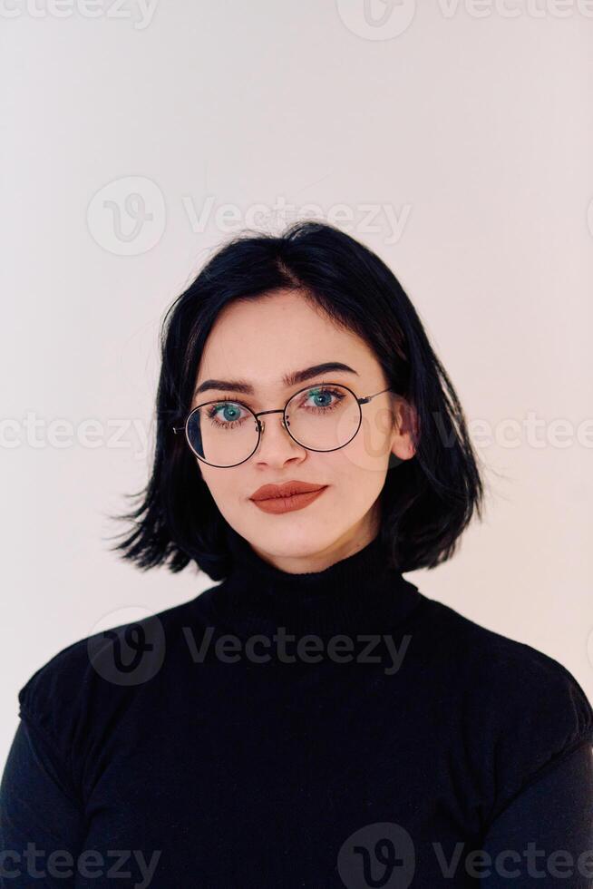 Smiling Brunette Woman Wearing Eyeglasses Poses on White Background photo