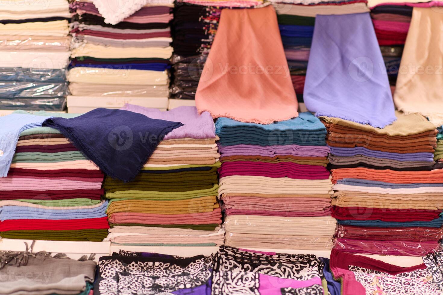 A Tapestry of Tradition. Colorful Array of Muslim Clothing for Sale on Istanbul Streets photo