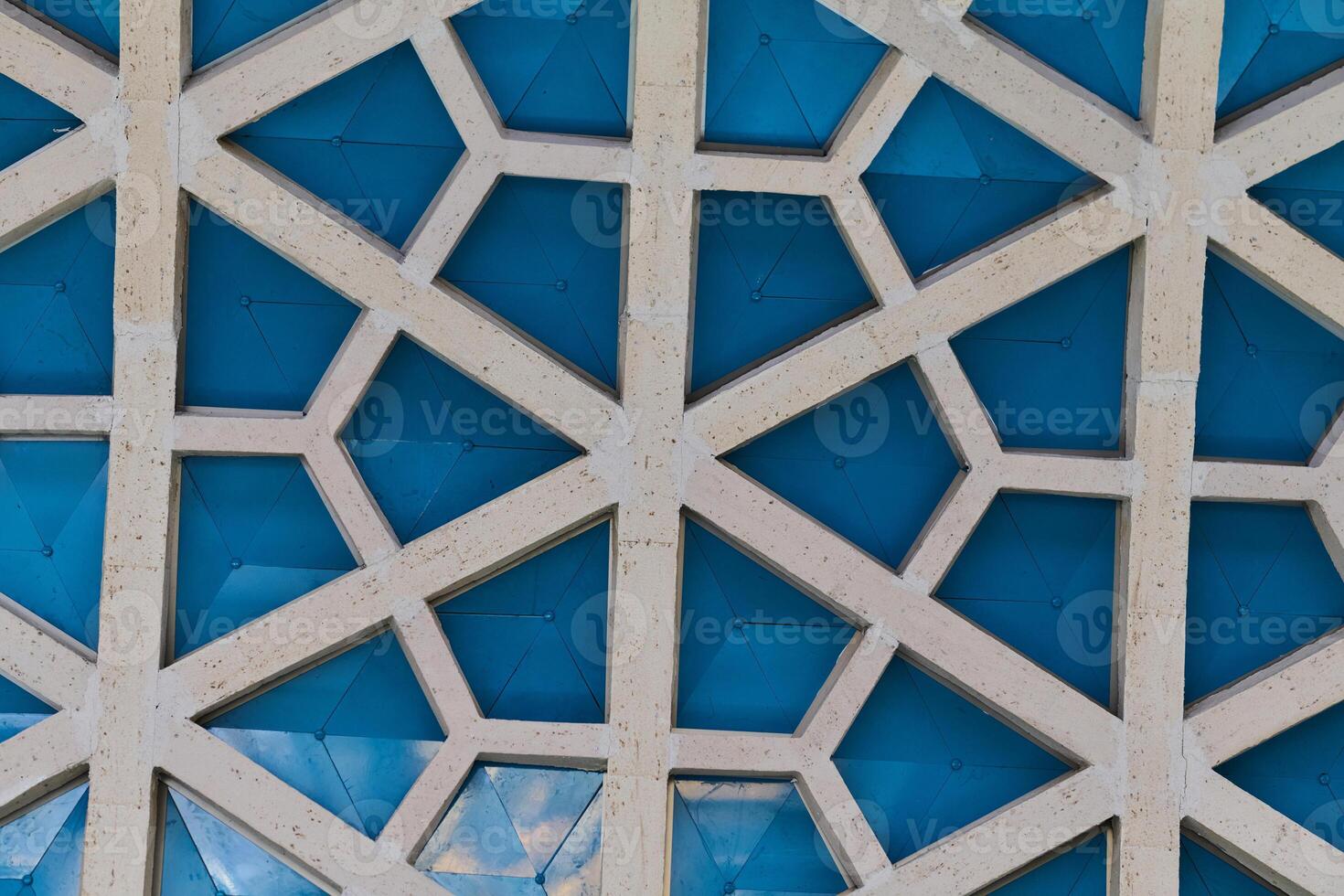 Architectural detail texture background with oriental hexagonal grid pattern photo