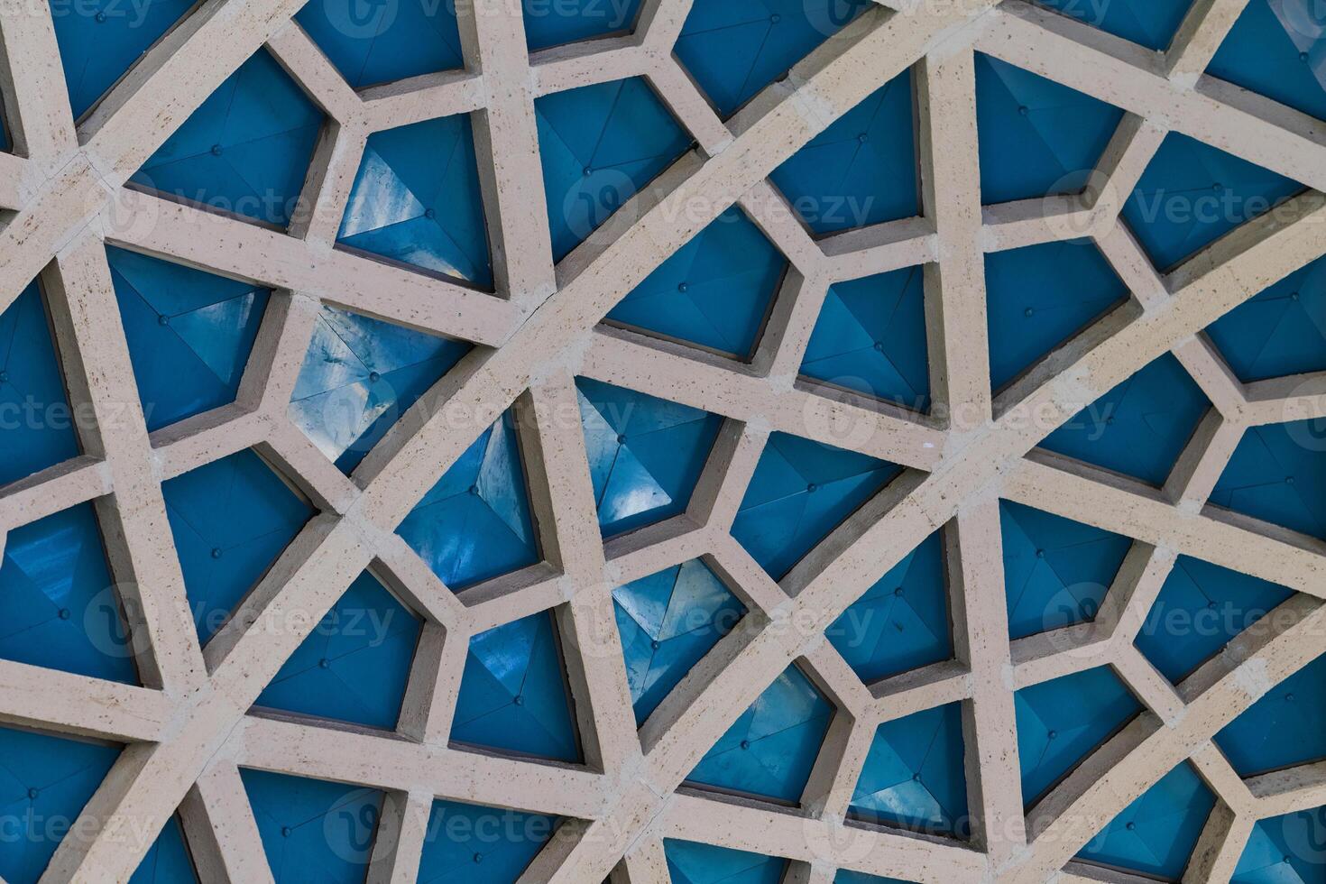 Architectural detail texture background with oriental hexagonal grid pattern photo