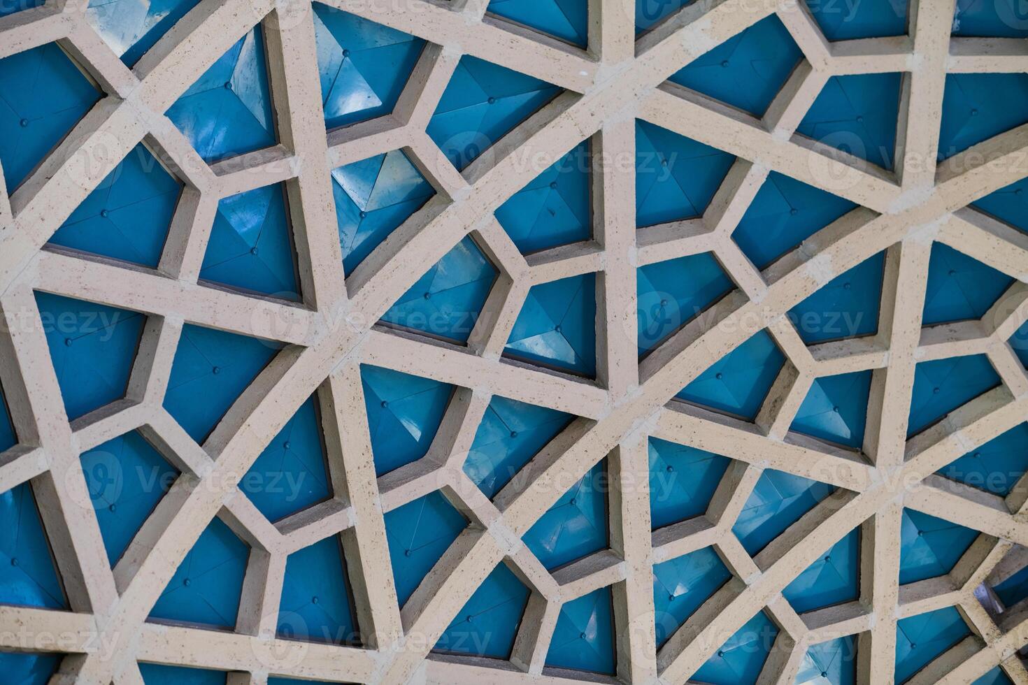 Architectural detail texture background with oriental hexagonal grid pattern photo