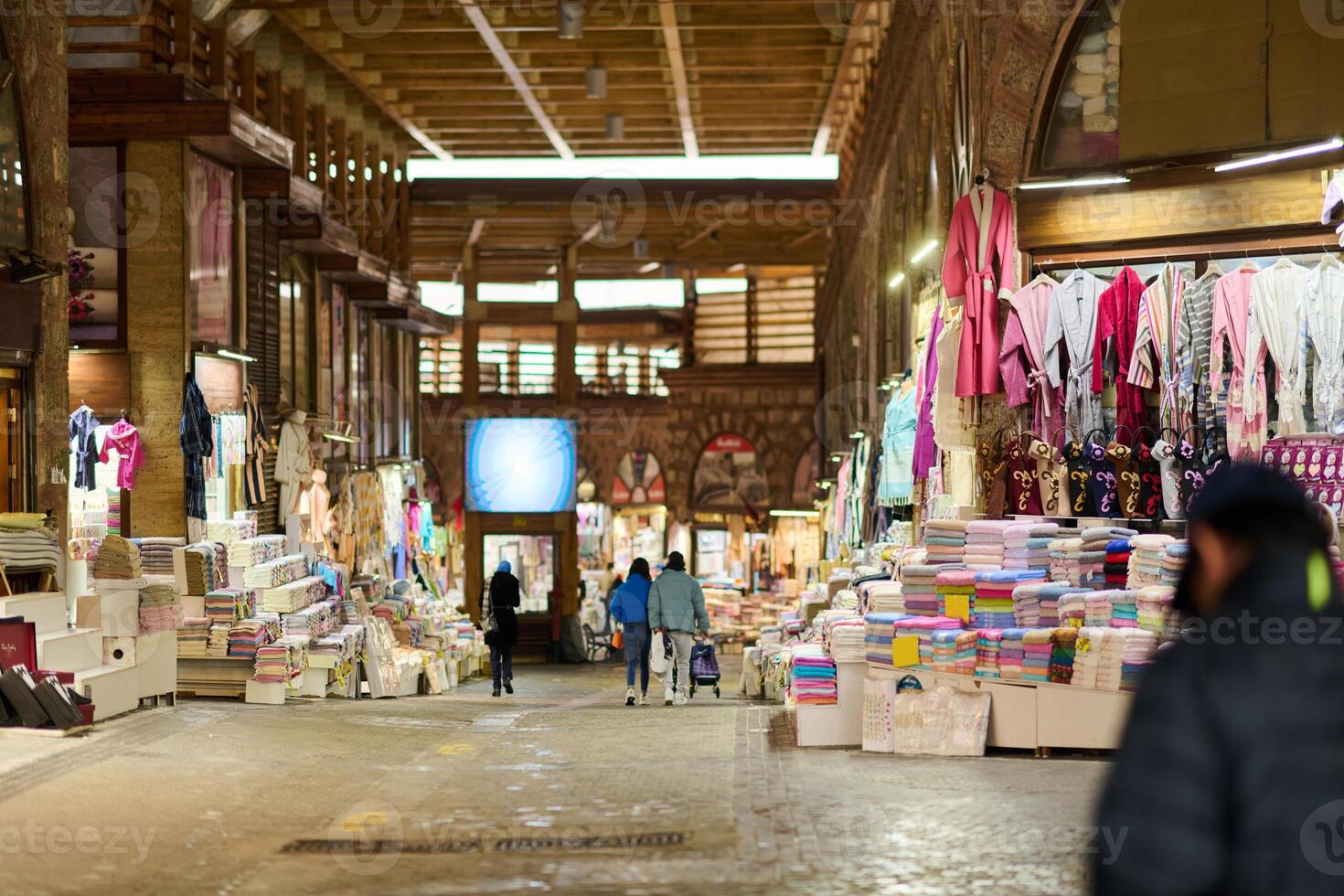 A Tapestry of Tradition. Colorful Array of Muslim Clothing for Sale on Istanbul Streets photo
