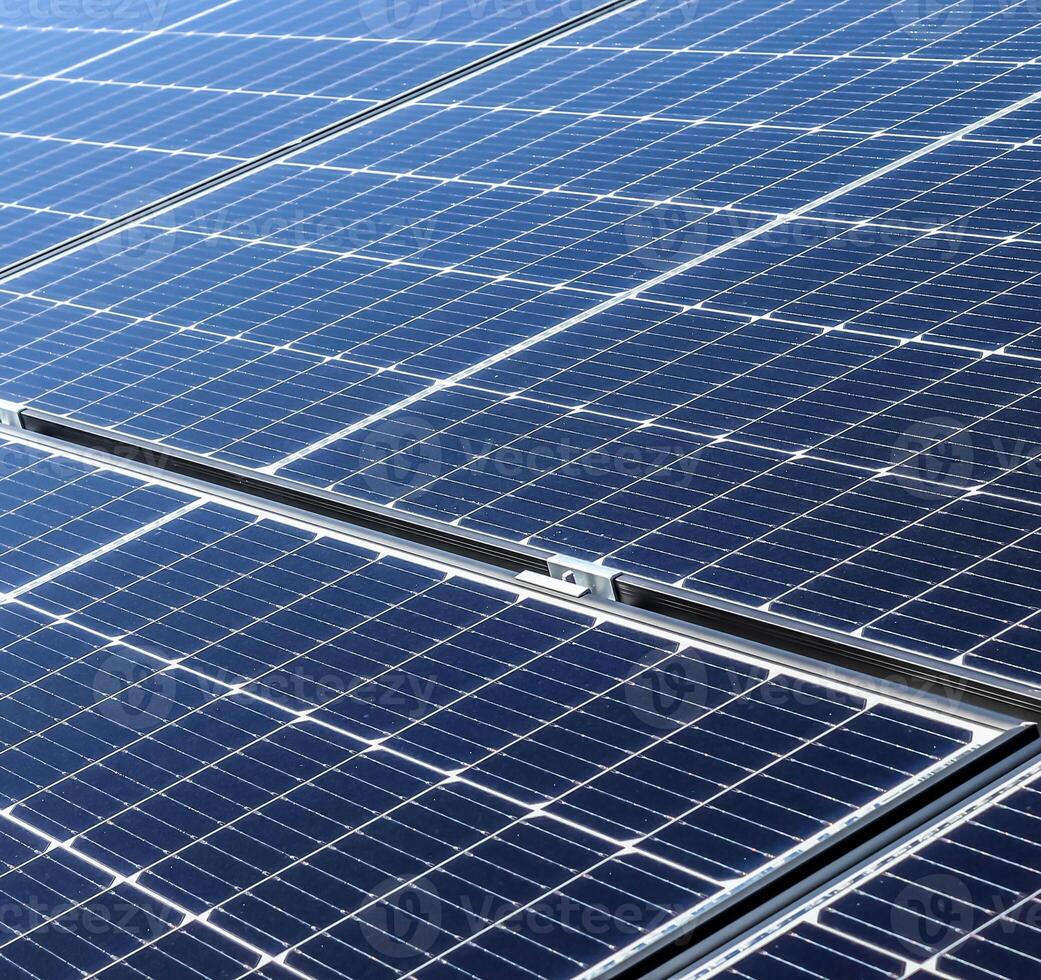 Generating clean energy with solar modules in a big park in nort photo