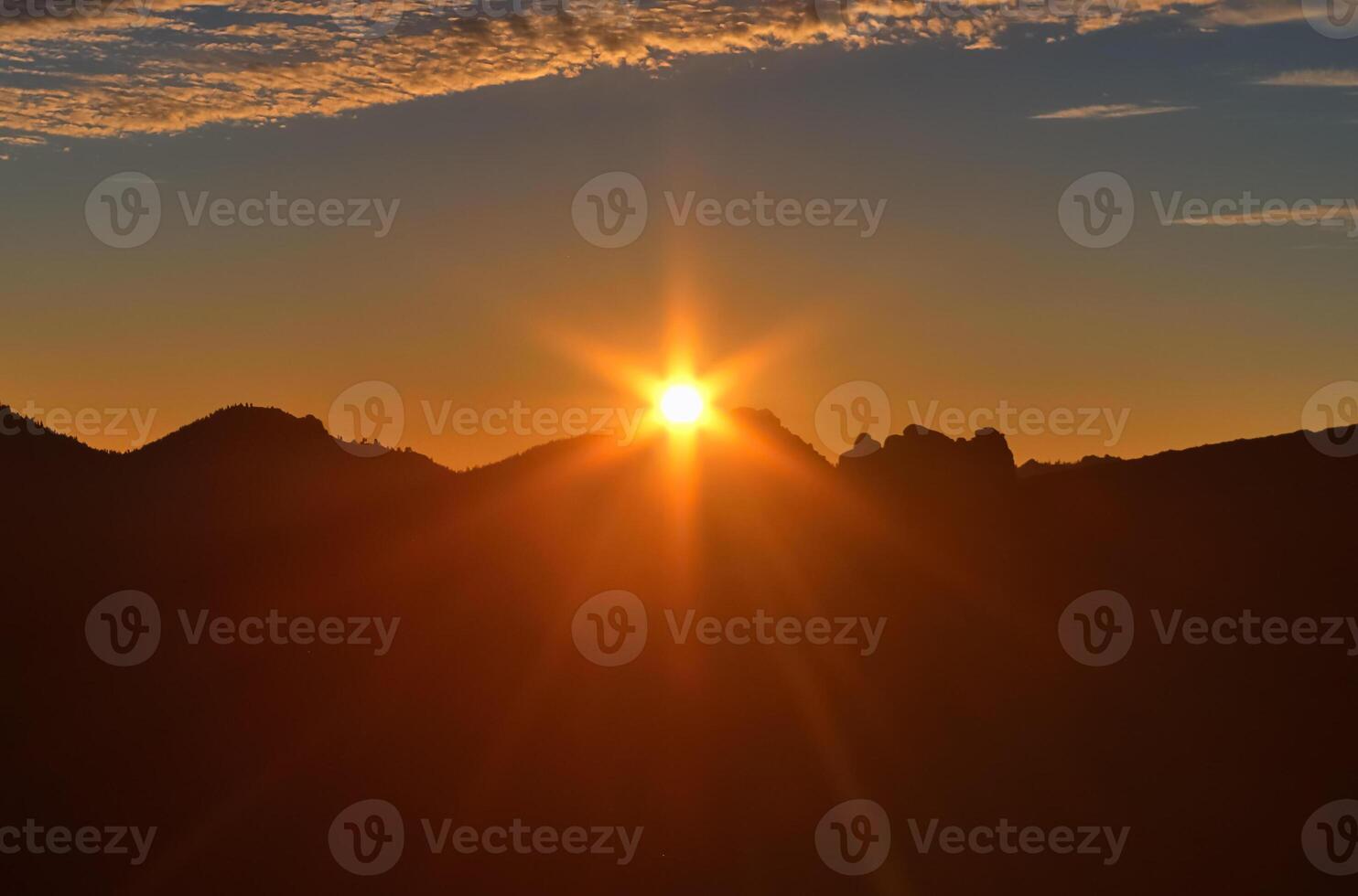 A dreamlike sunset at the famous rock formations of Roques de Garcia on Tenerife. photo
