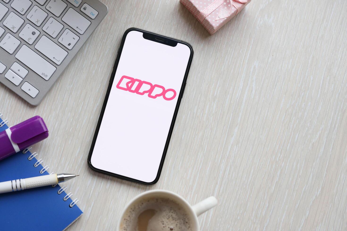 KYIV, UKRAINE - FEBRUARY 23, 2024 Kippo logo of famous dating website or app on iPhone display photo