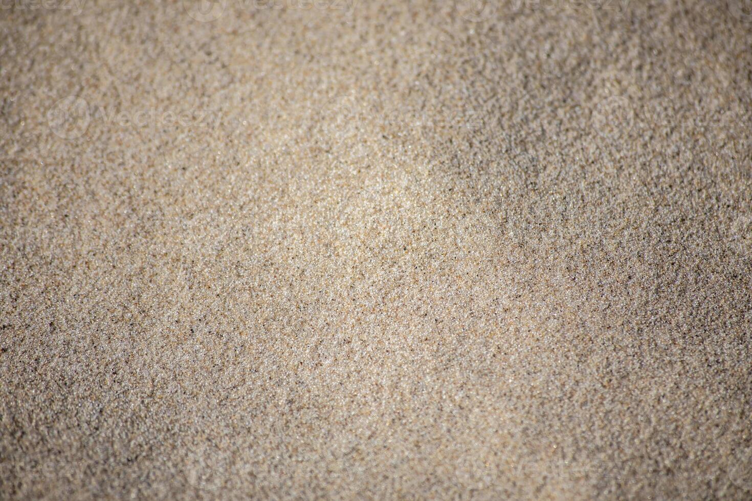 Close Up View Of Fine Sand Grains On A Beach photo