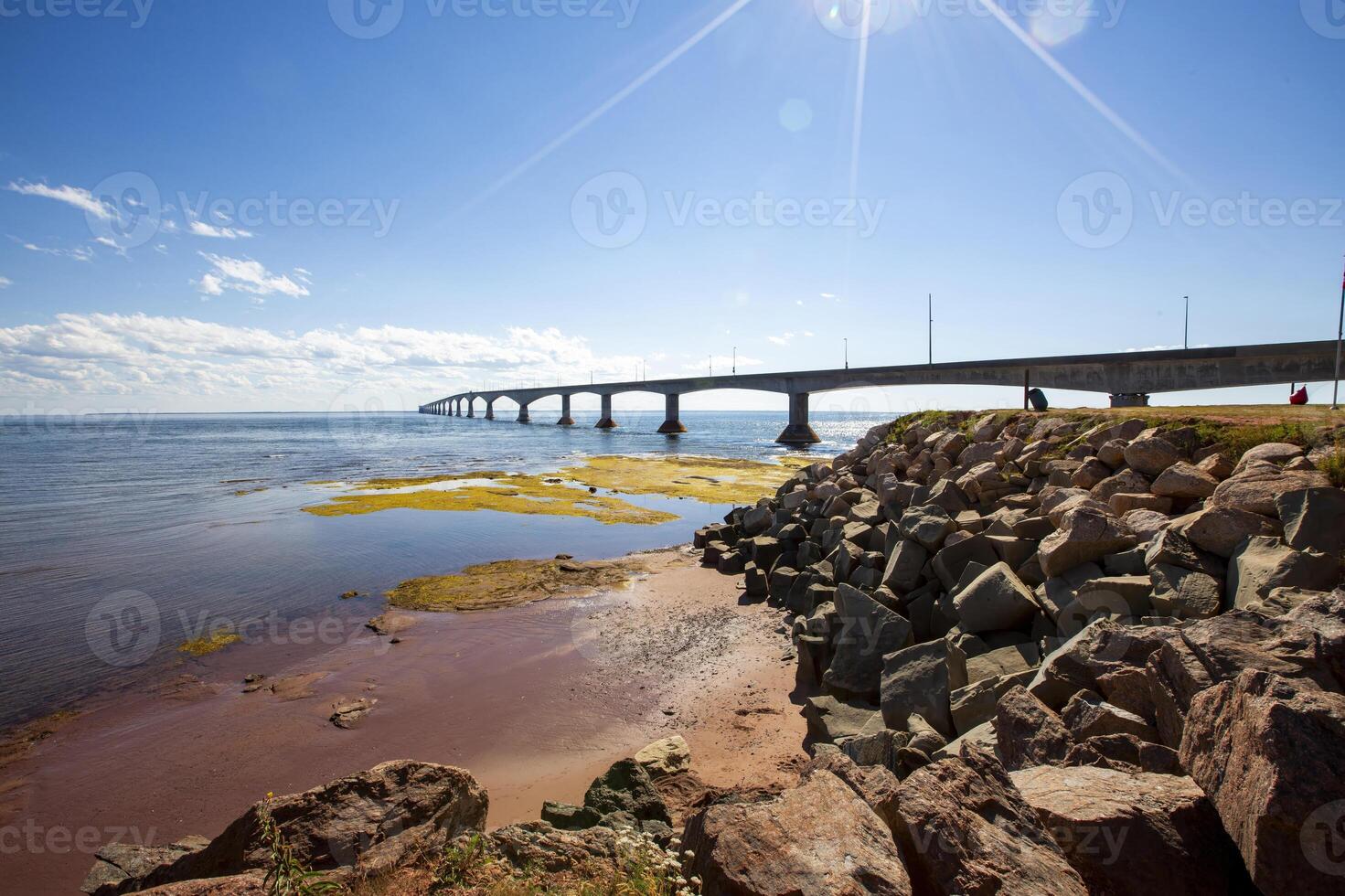 View of the Confederation Bridge From the Prince Edward Island Shore on a Sunny Day photo