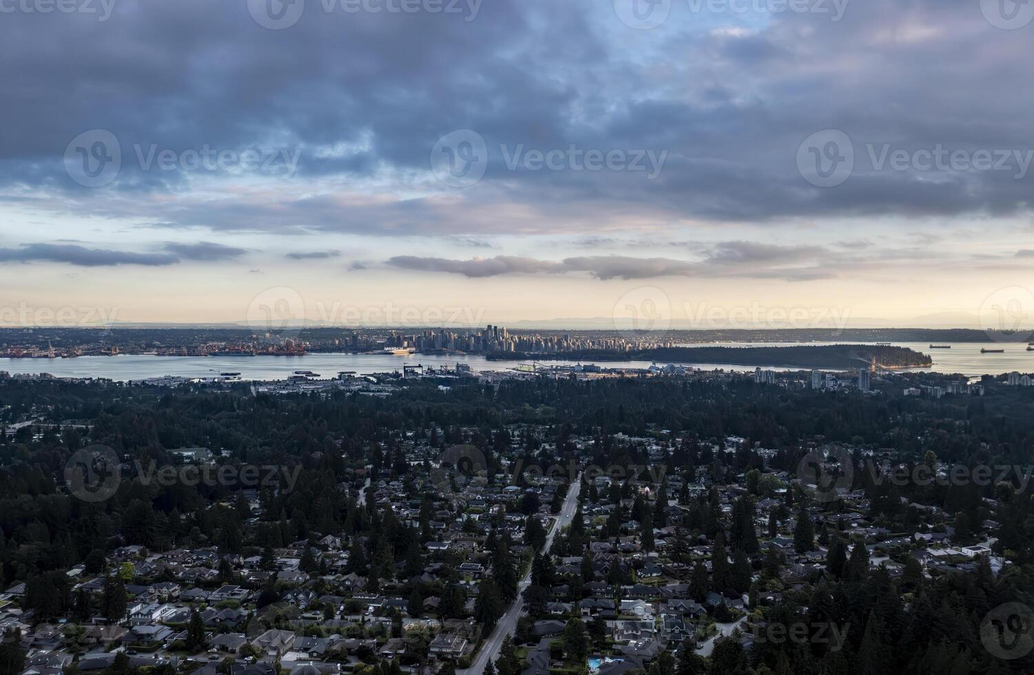 Aerial View of Vancouver Skyline and Surrounding Suburbs at Sunset photo