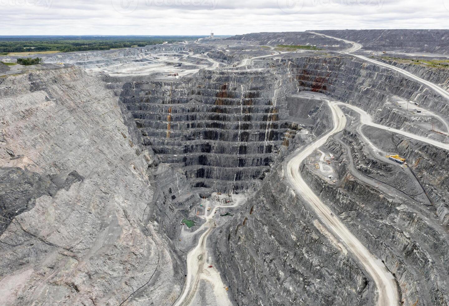 Aerial View of a Large Open Pit Mine in a Forested Area in Abitibi-Temiscamingue, Quebec, Canada photo