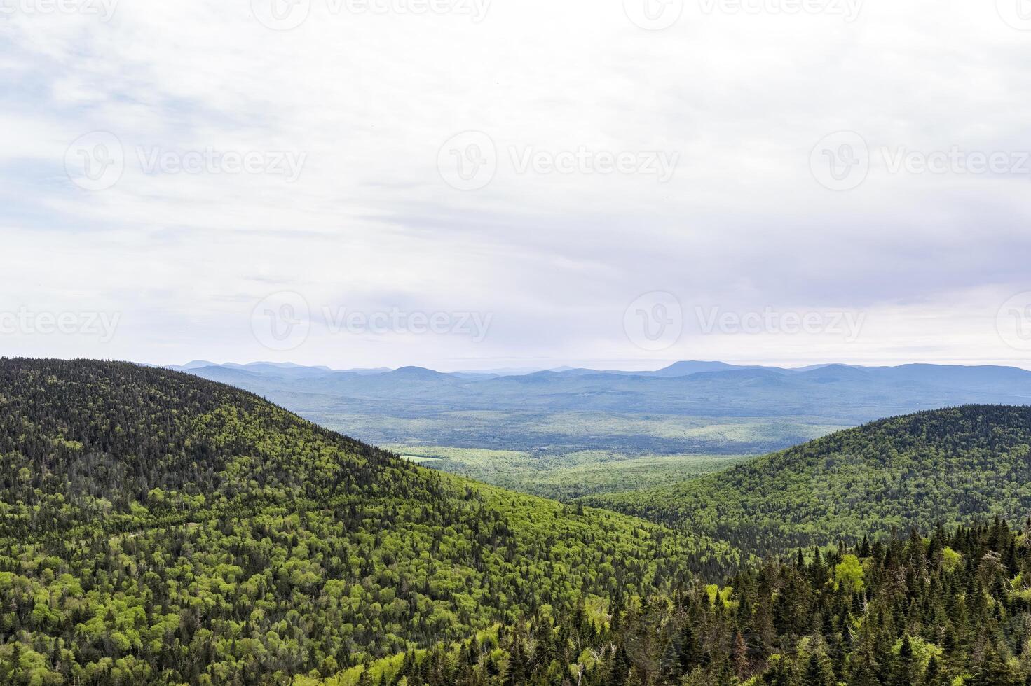 Scenic View of Mount Megantic, Quebec, Canada, and Distant Mountains on a Cloudy Day photo