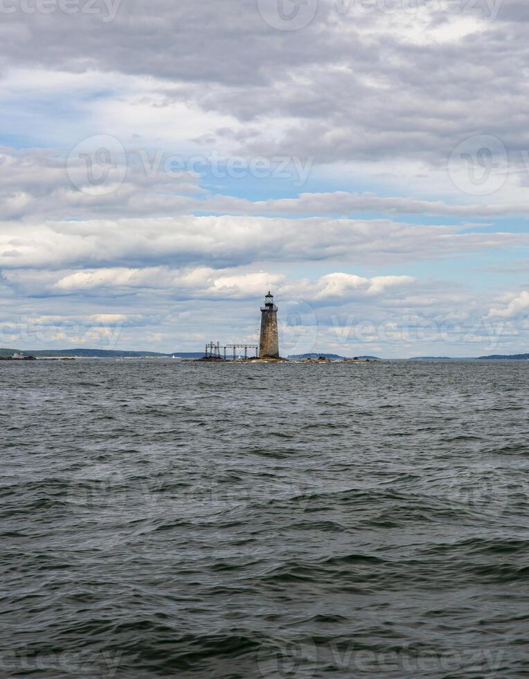 A Distant View of the Ram Island Ledge Light Station on a Cloudy Day photo