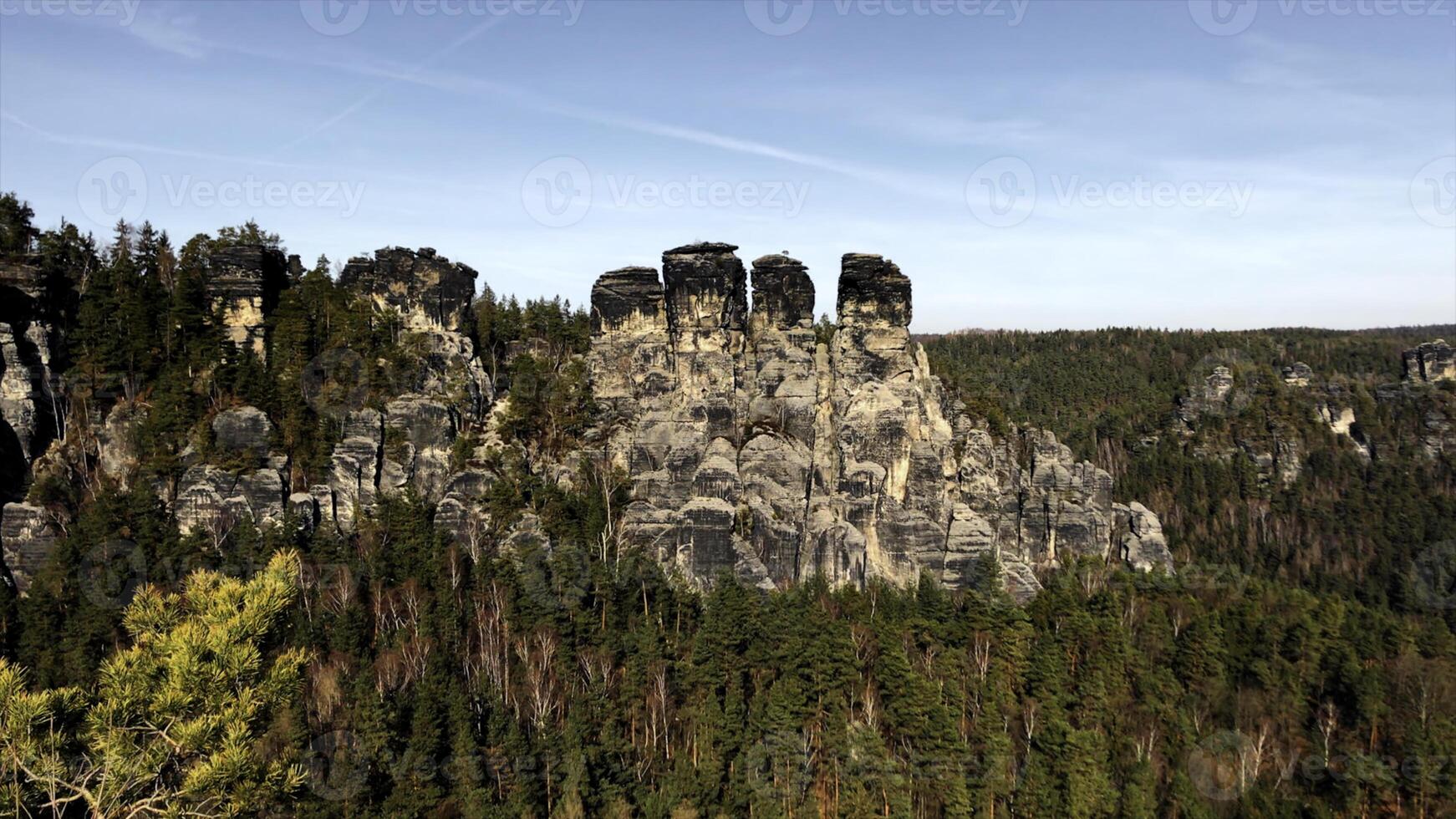 Stunning, unique cliffs near Prague during sunset, Czech Republic landscape. Media. Forested valley with mountains. photo