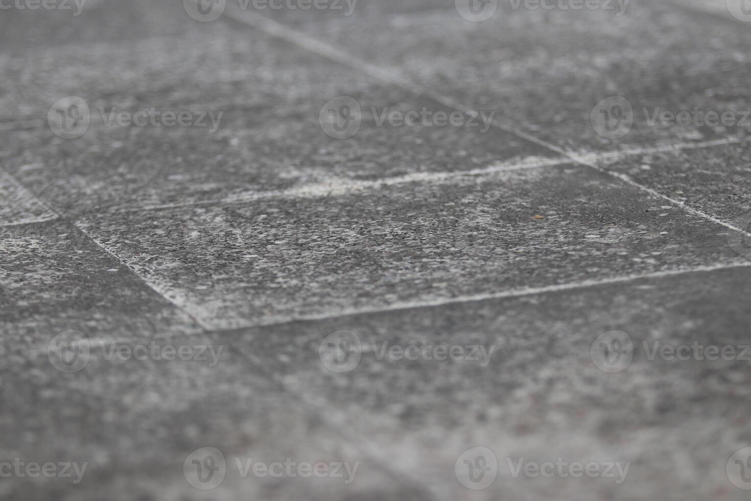 Cement tile pavement in close up view photo