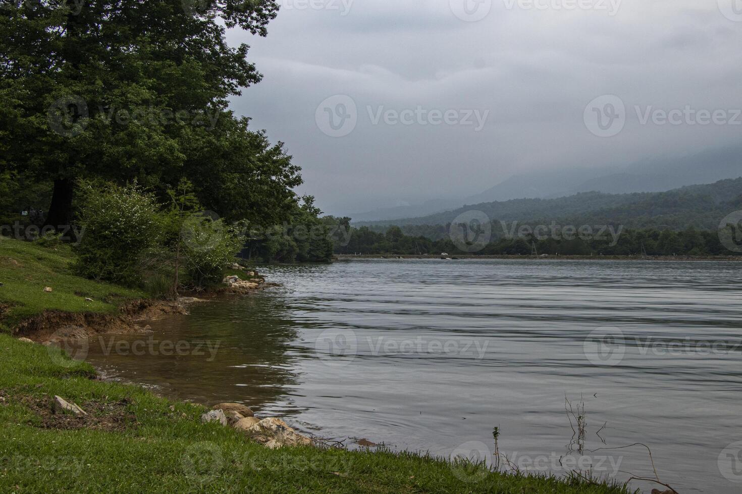 A beautiful lake in the heart of the forest photo
