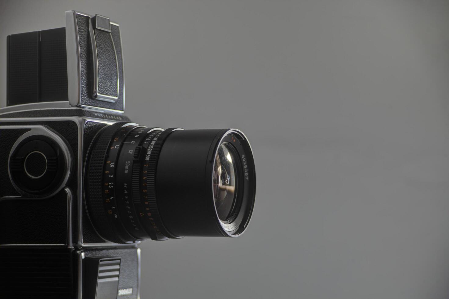Evora, Portugal. May 15, 2010.A Hasselblad camera, iconic in its design, rests elegantly against a sleek gray backdrop, embodying sophistication and creativity. photo