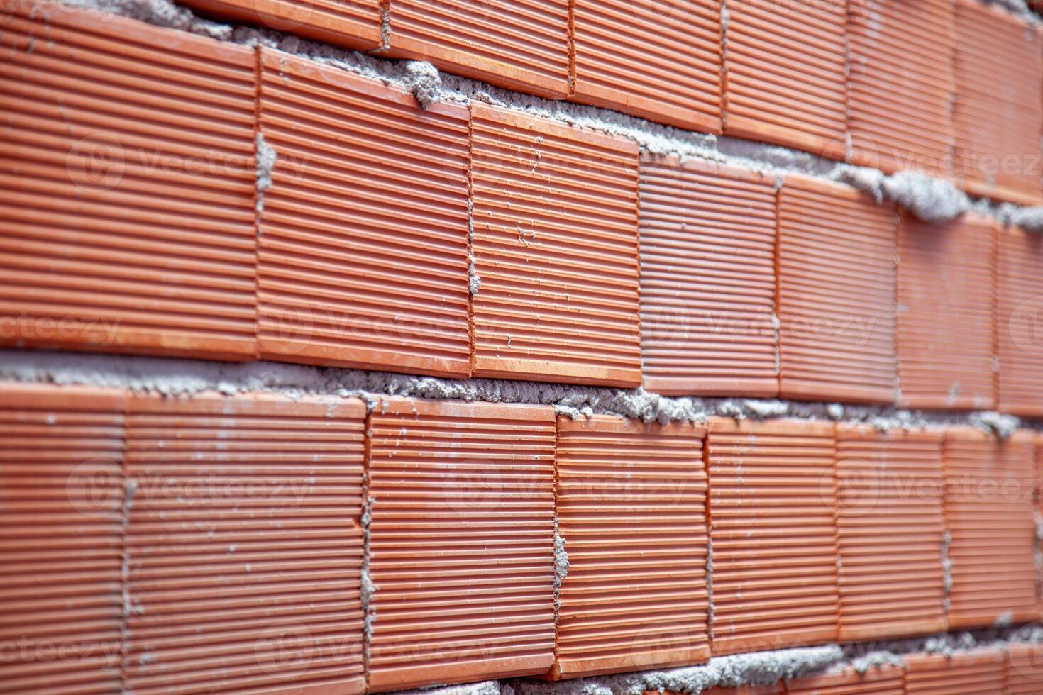 Rustic brick wall background, perfect for adding a touch of urban charm to any design project. photo